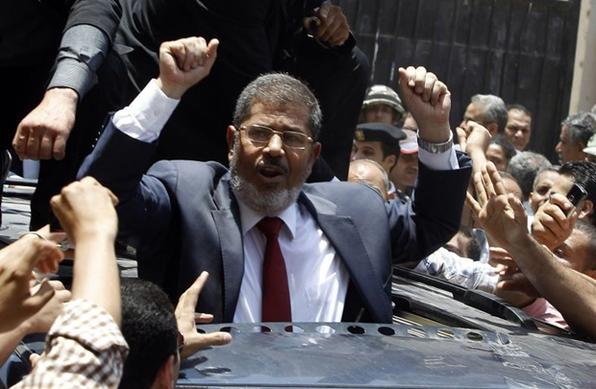 Mohamed Morsy, novo presidente do Egito, comemora o resultado  - REUTERS/Ahmed Jadallah