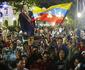 Em clima de luto, venezuelanos tomam as ruas para homenagear Hugo Chávez
