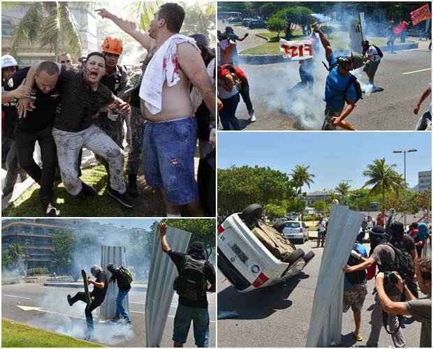 Manifestantes feridos são socorridos; mascarados depredam a cidade e polícia revida com bombas e spray de pimenta: tumulto e quebra-quebra