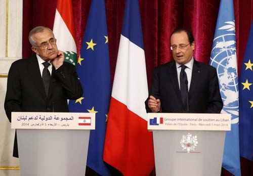 Presidente do Líbano, Michel Suleiman, e o presidente francês, François Hollande comparecem à Reunião do Grupo de Apoio Internacional para o Líbano, no Palácio do Eliseu, em Paris