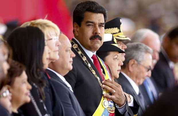 O presidente da Venezuela, Nicolas Maduro, chega ao desfile militar em comemoração a Hugo Chávez