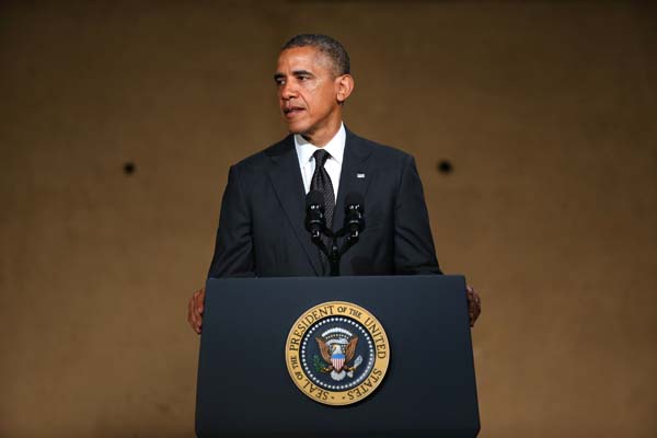 Obama fala durante a cerimônia de inauguração do museu onde ficavam as Torres Gêmeas do World Trade Center