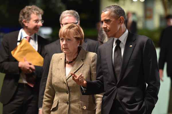 Chanceler alemã Angela Merkel e o presidente dos EUA Barack Obama durante reunião em Brisbane