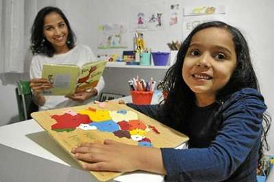 A arquiteta Emília Lourenço e a filha, Clarissa. 