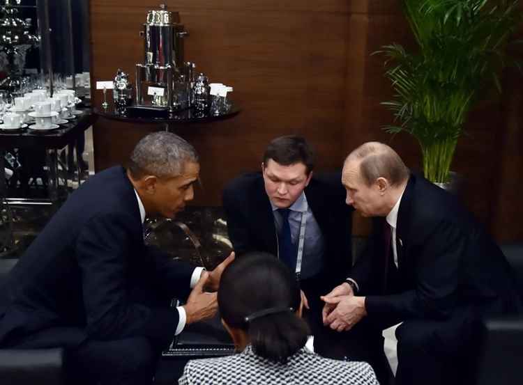 O presidente russo, Vladimir Putin, com o presidente dos EUA, Barack Obama