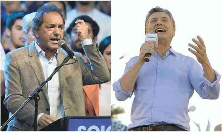 Scioli e Macri, nos últimos discursos de campanha: cenário de indecisão (foto: Desk/AFP)