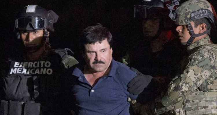 Joaquín El Chapo Guzmán é conduzido após recaptura, em janeiro