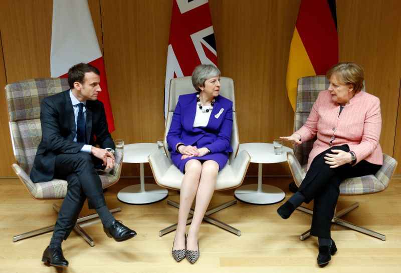 A primeira-ministra britânica Theresa May , a chanceler alemã Angela Merkel  e o presidente francês Emmanuel Macron