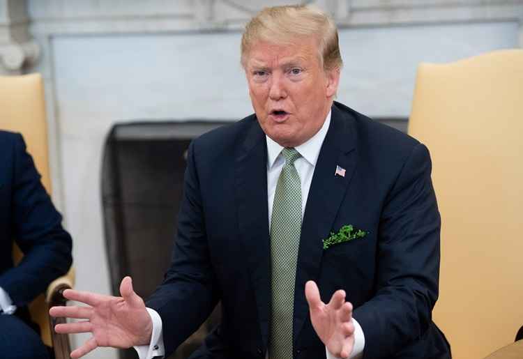 US President Donald Trump speaks to the press as he meets with Irish Prime Minister Leo Varadkar in the Oval Office of the White House in Washington, DC, March 14, 2019. / AFP / SAUL LOEB