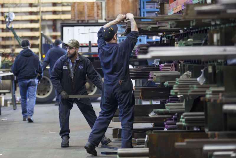 Trabalhadores em Fábrica dos EUA