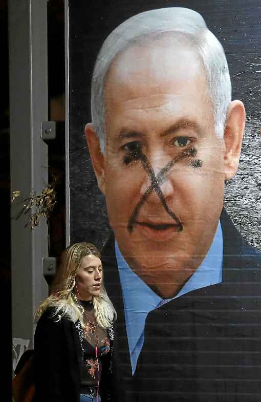 Outdoor de Netanyahu pichado em JerusalÃ©m: aÃ§Ã£o por corrupÃ§Ã£o