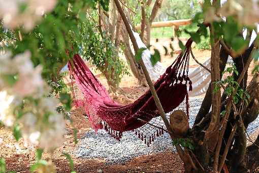 A Vila Kundalini oferece espaÃ§o com redes, piscina e ambientes de lazer