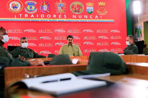 O presidente da Venezuela, Nicolas Maduro (C), falando durante uma reuniÃ£o com membros das ForÃ§as Armadas Nacionais Bolivarianas (FANB), no PalÃ¡cio Presidencial de Miraflores, em Caracas, em 21 de maio de 2020, durante o novo coronavÃ­rus, COVID- 19, pandemia.